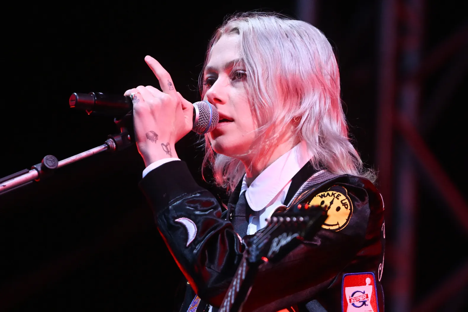Phoebe Bridgers performing live on stage